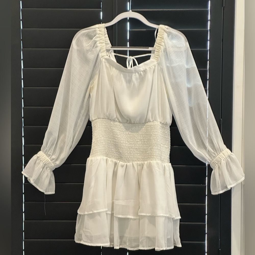 White dress with mesh sleeves. Size medium from the clothing company.